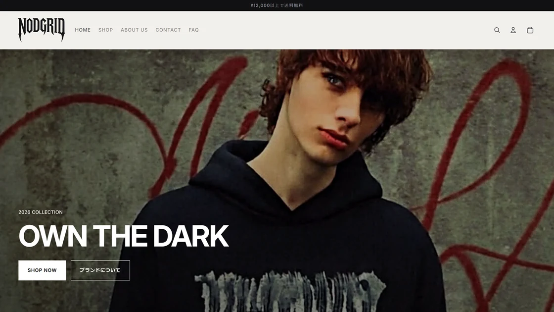 NODGRID のネットショップ。「OWN THE DARK」の見出しと、購入ページとブランド紹介への2つの導線が並ぶ。